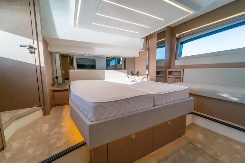  Yacht Photos Pics Luxurious interior of 2024 Prestige 520 yacht with modern bedroom design.