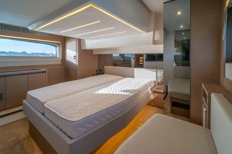  Yacht Photos Pics Luxurious interior of 2024 Prestige 520 yacht with modern bedroom design.