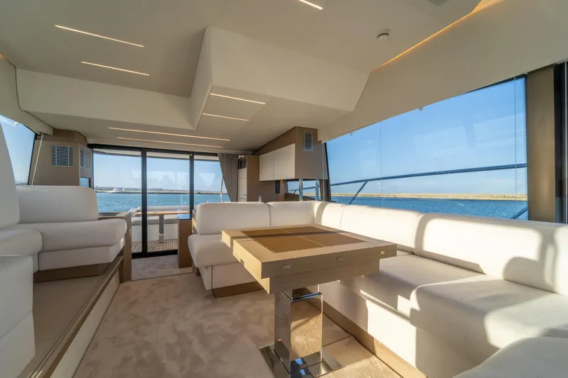  Yacht Photos Pics Luxurious interior of 2024 Prestige 520 yacht with panoramic ocean views.