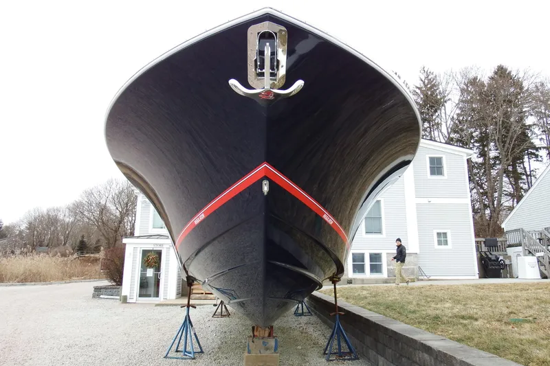  Yacht Photos Pics 2018 Regulator 34SS boat on stands, front view, near residential area.