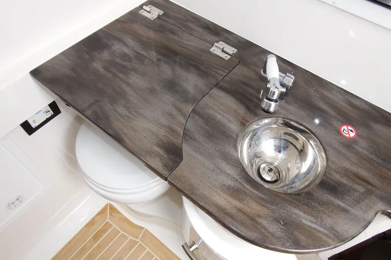  Yacht Photos Pics 2018 Regulator 34SS boat bathroom with sink and toilet.