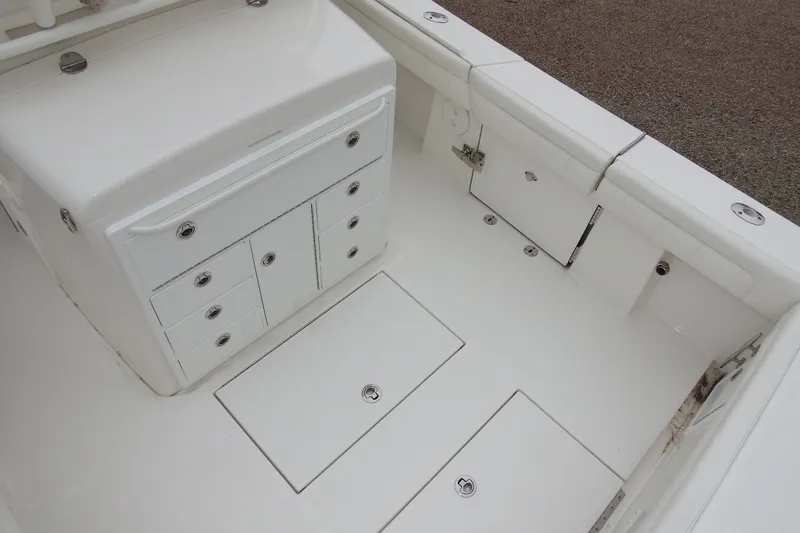  Yacht Photos Pics 2018 Regulator 34SS boat interior with storage compartments and seating.