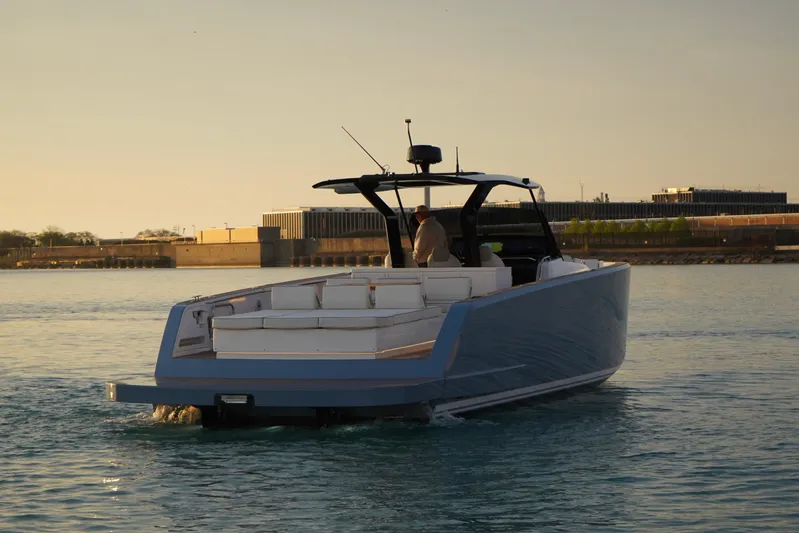  Yacht Photos Pics 2025 Pardo Yachts P43 cruising on calm waters at sunset.