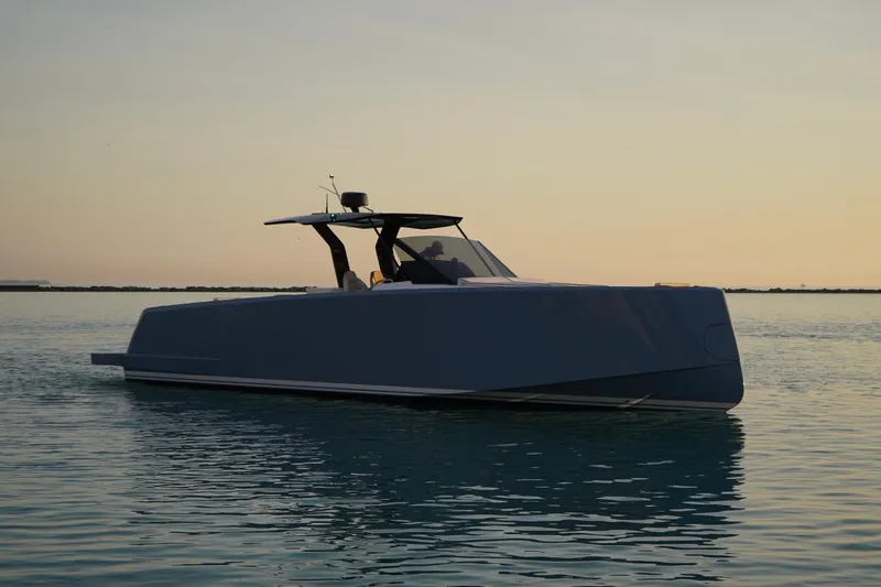  Yacht Photos Pics 2025 Pardo Yachts P43 cruising at sunset on calm waters.