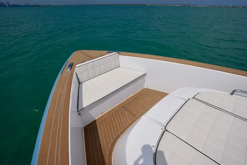  Yacht Photos Pics 2025 Pardo Yachts P43 deck with white seating, overlooking calm turquoise waters.