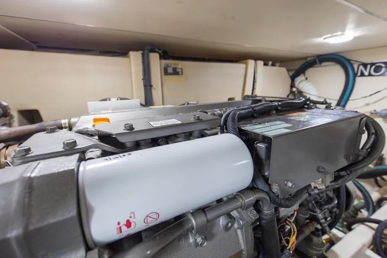 Pipe Dream Yacht Photos Pics Engine room of 2008 Luhrs 35 Convertible boat, showcasing mechanical components.