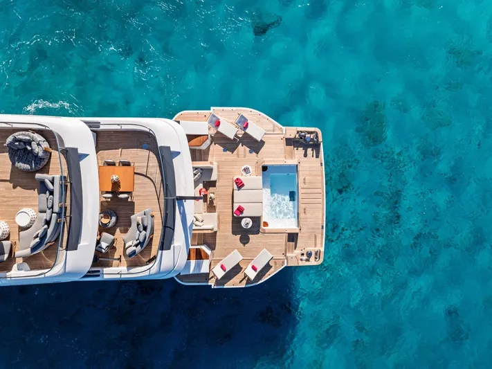 Contigo Yacht Photos Pics Aerial view of 2024 Benetti 40M Oasis yacht with luxurious deck and pool.