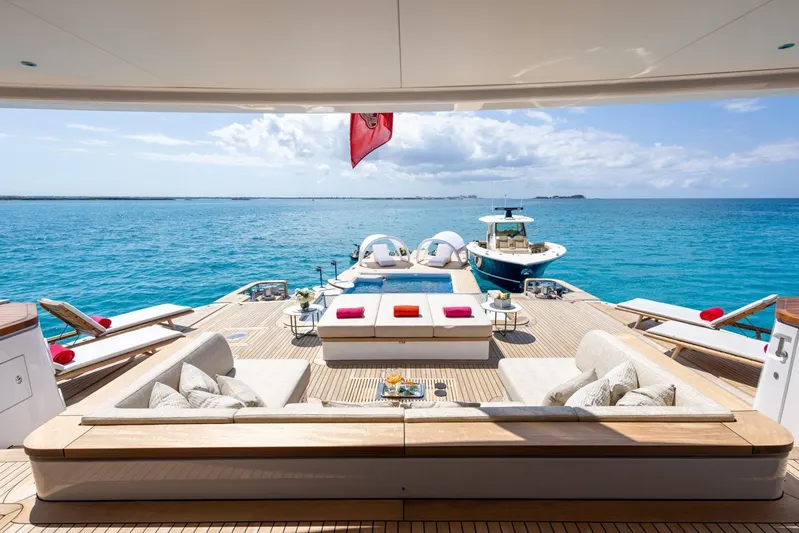 Contigo Yacht Photos Pics Luxurious 2024 Benetti 40M Oasis yacht with spacious deck and stunning ocean view.