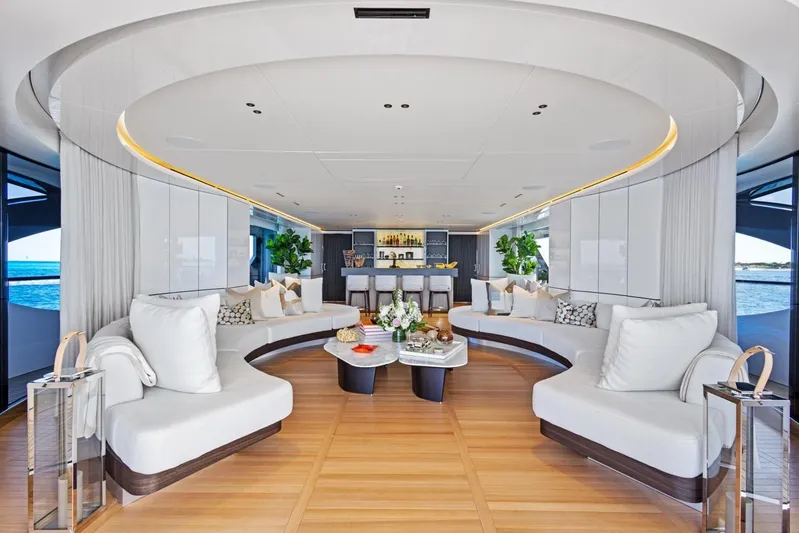 Contigo Yacht Photos Pics Luxurious interior of 2024 Benetti 40M Oasis yacht with elegant seating and modern decor.