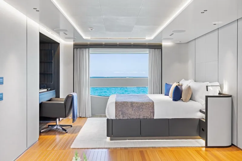 Contigo Yacht Photos Pics Luxurious bedroom on 2024 Benetti 40M Oasis yacht with ocean view.