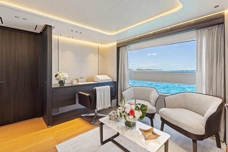 Contigo Yacht Photos Pics Luxurious interior of 2024 Benetti 40M Oasis yacht with ocean view and elegant furnishings.