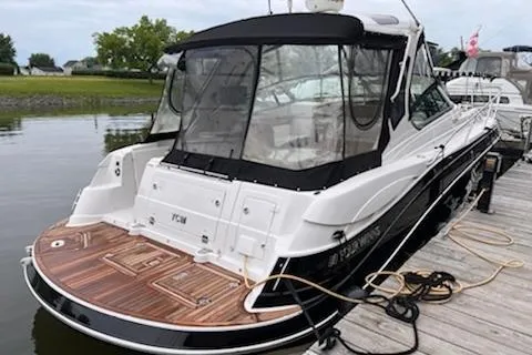  Yacht Photos Pics 2015 Four Winns 375 Vista boat docked, featuring sleek design and spacious deck.