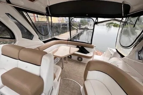  Yacht Photos Pics Interior of 2015 Four Winns 375 Vista yacht with elegant seating and waterfront view.