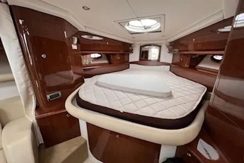  Yacht Photos Pics Luxurious interior of 2015 Four Winns 375 Vista yacht with elegant wood finish.