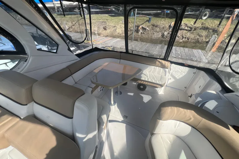  Yacht Photos Pics Interior of 2015 Four Winns 375 Vista boat with seating and table.