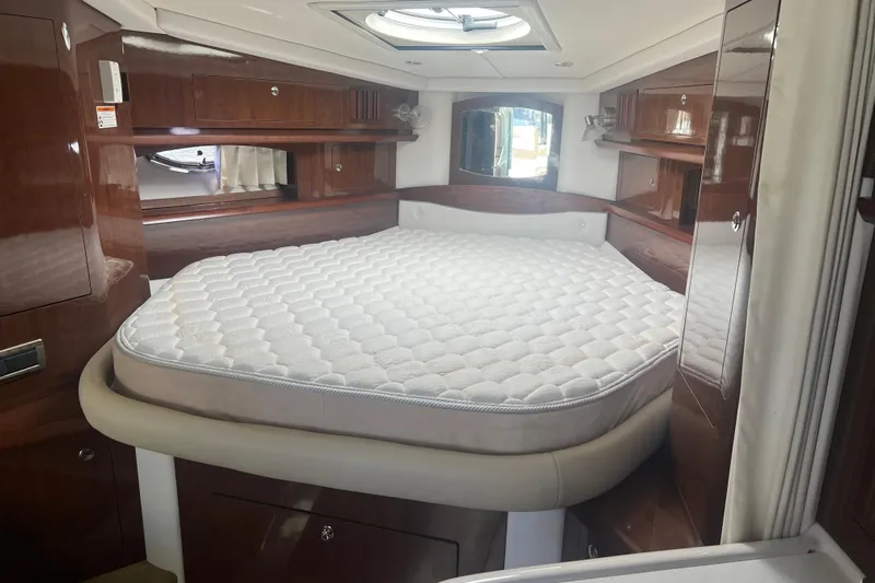  Yacht Photos Pics Luxurious cabin interior of 2015 Four Winns 375 Vista yacht with plush bedding.