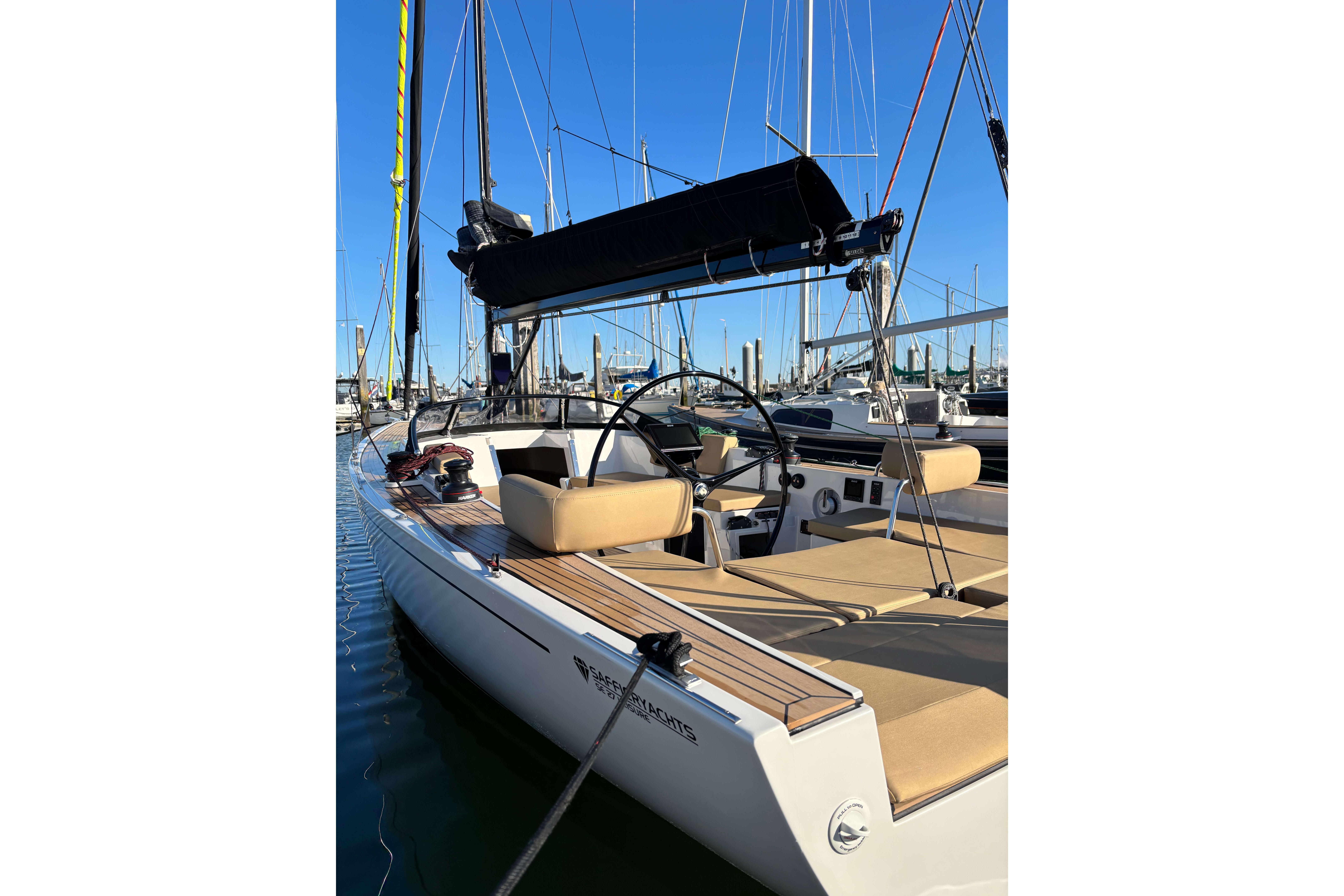 2023 Saffier Se 27 Leisure sailboat docked, featuring sleek design and modern amenities.
