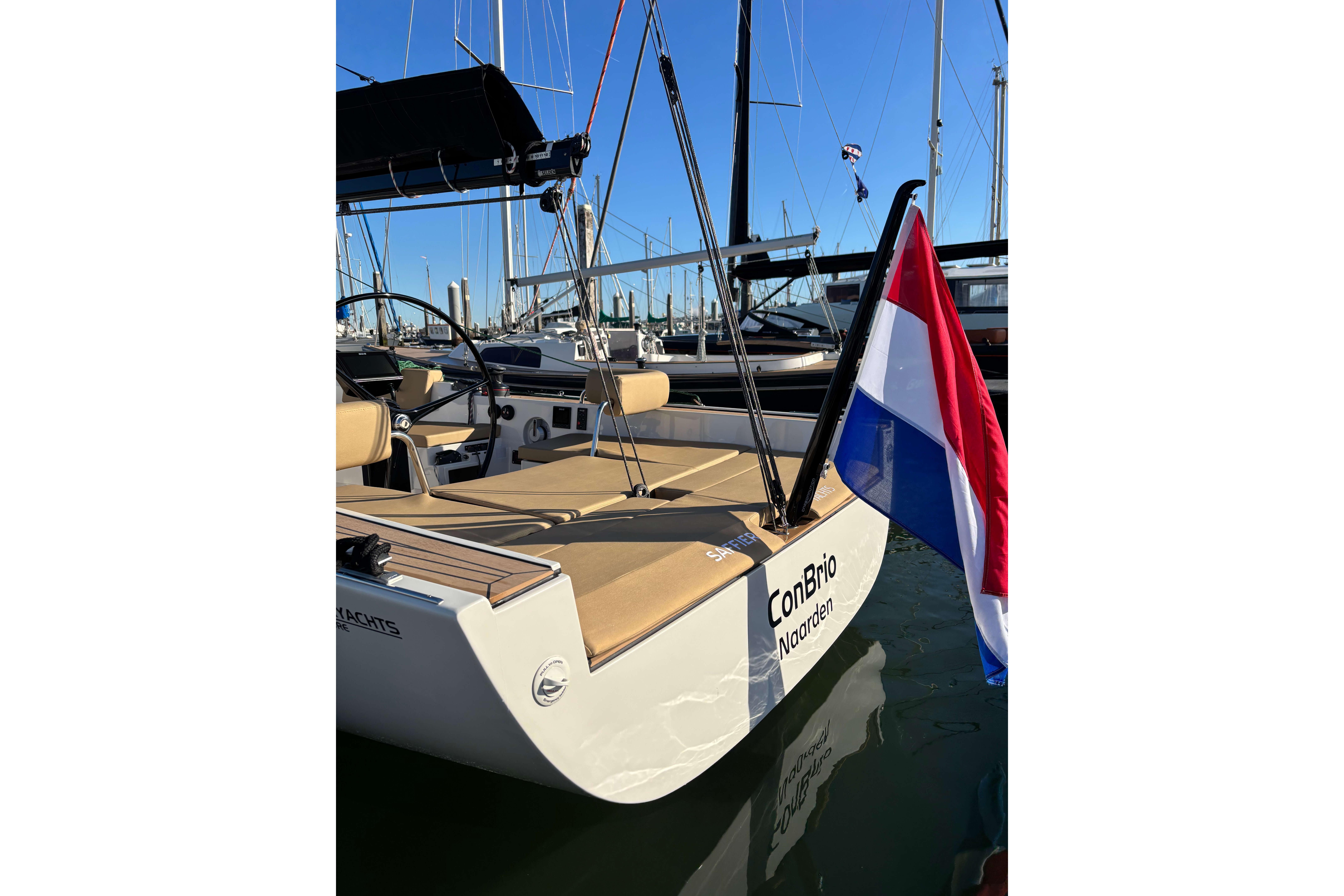 2023 Saffier Se 27 Leisure yacht with Dutch flag in marina.