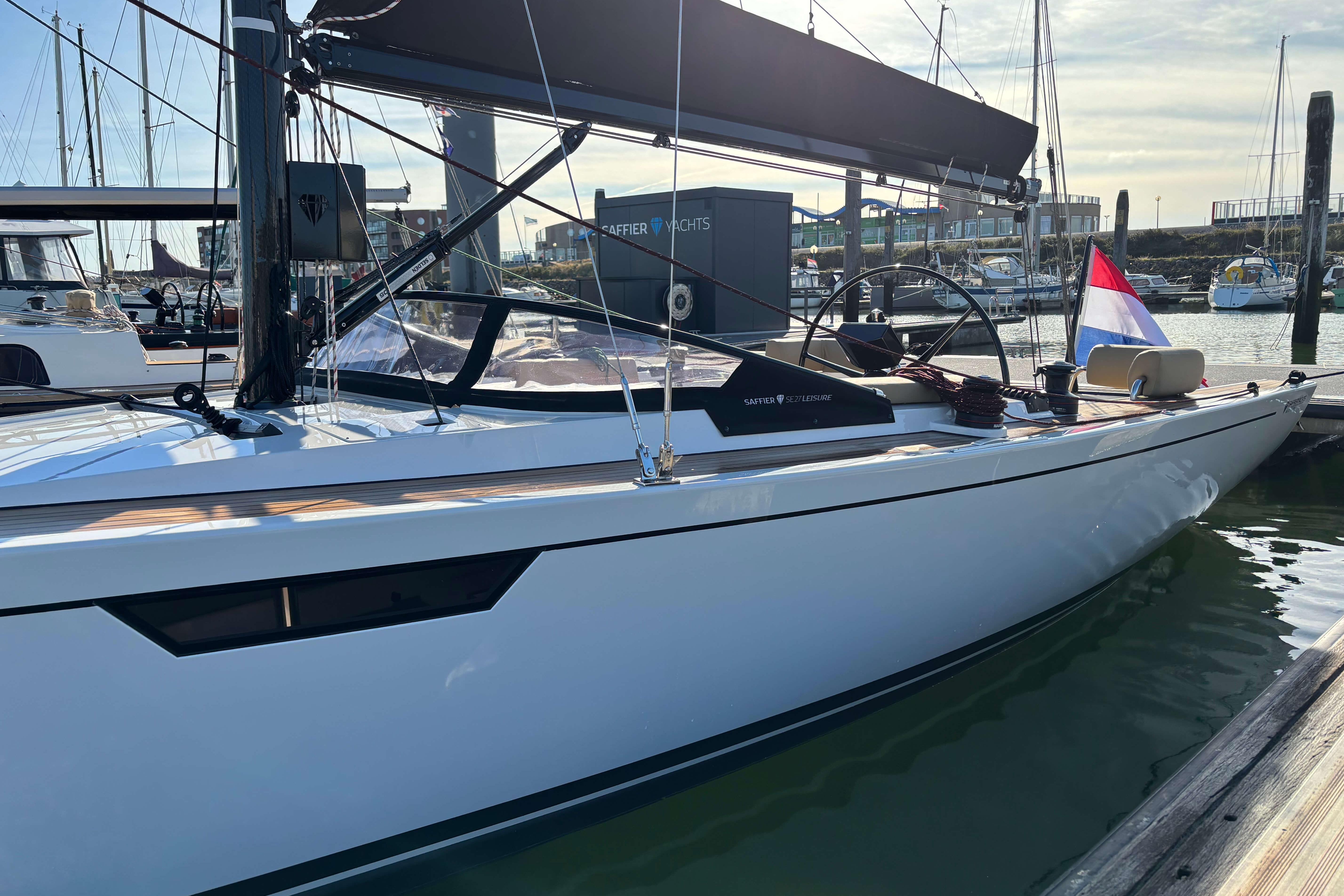 2023 Saffier Se 27 Leisure yacht docked at marina, featuring sleek design and modern amenities.