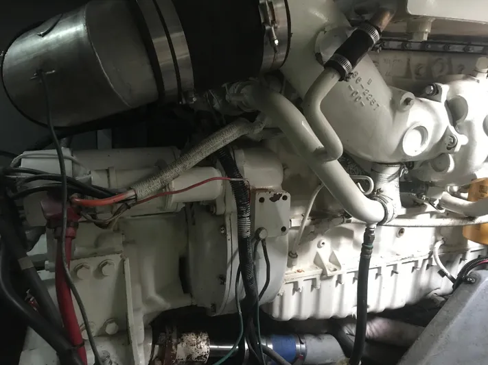 My Girl Yacht Photos Pics Engine of a 1995 Sea Ray 450 Sundancer boat, showcasing intricate mechanical components.