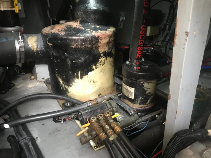 My Girl Yacht Photos Pics Engine room of 1995 Sea Ray 450 Sundancer with visible mechanical components.