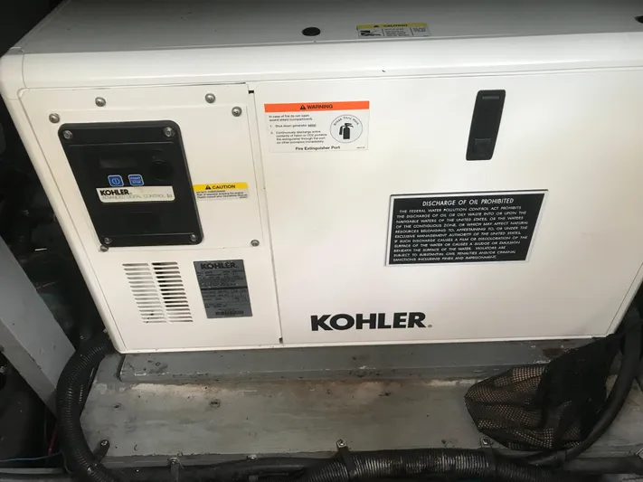 My Girl Yacht Photos Pics Kohler generator in 1995 Sea Ray 450 Sundancer boat engine room.