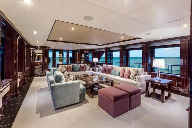 Ionian Princess Yacht Photos Pics Luxurious yacht interior with elegant seating, ocean view, and modern decor, Christensen 2005 model.