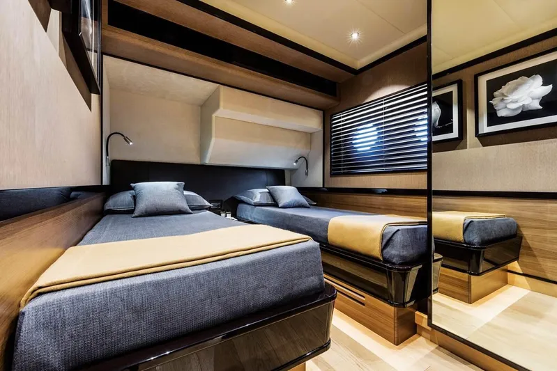  Yacht Photos Pics Luxurious 2019 Absolute Navetta 73 yacht cabin with twin beds and modern decor.