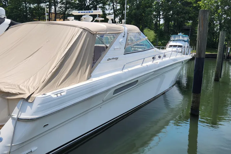  Yacht Photos Pics 1998 Sea Ray 630 Super Sun Sport yacht docked in a marina.