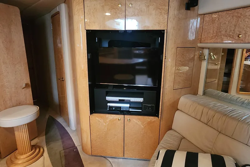  Yacht Photos Pics Luxurious interior of 1998 Sea Ray 630 Super Sun Sport yacht with entertainment center.