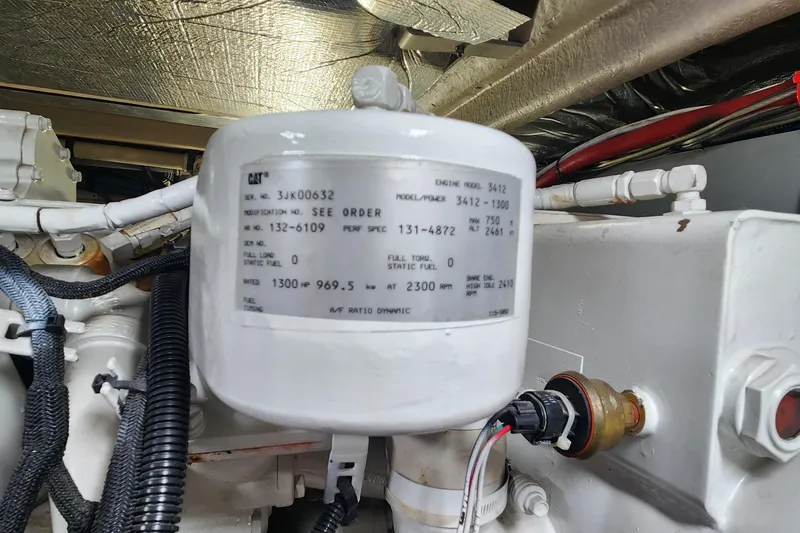  Yacht Photos Pics Engine compartment of a 1998 Sea Ray 630 Super Sun Sport with CAT engine details.