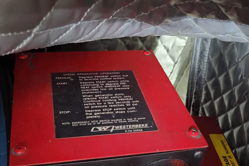  Yacht Photos Pics Red diesel generator control panel with operation instructions, Sea Ray 630 Super Sun Sport, 1998.