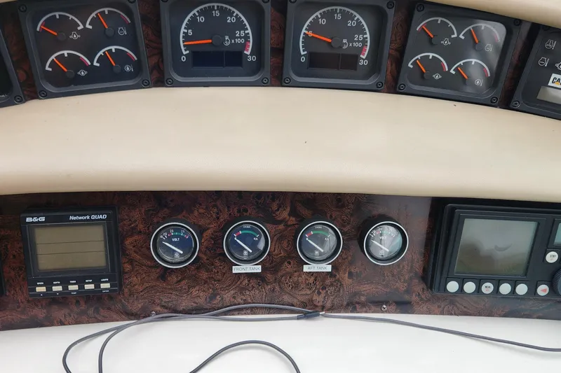 Yacht Photos Pics Dashboard of a 1998 Sea Ray 630 Super Sun Sport with gauges and navigation equipment.