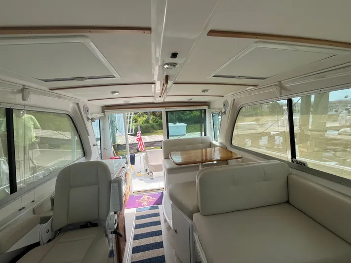  Yacht Photos Pics Interior of 2016 Back Cove 34 Express yacht with spacious seating and elegant design.