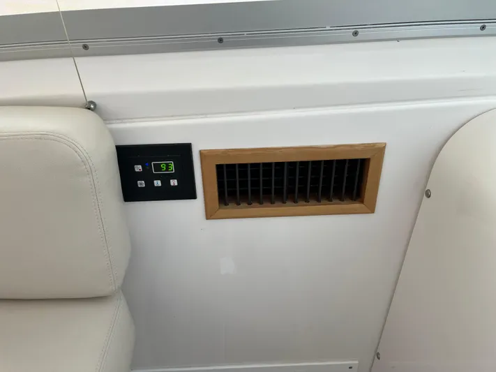  Yacht Photos Pics Interior of 2016 Back Cove 34 Express showing air vent and control panel.
