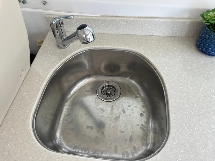  Yacht Photos Pics Stainless steel sink with modern faucet on Back Cove 34 Express, 2016 model.