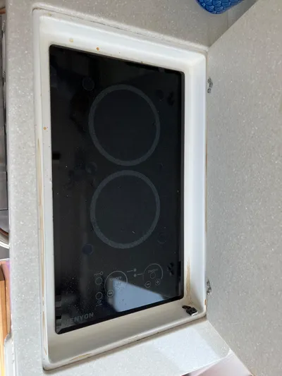  Yacht Photos Pics Built-in stovetop on 2016 Back Cove 34 Express yacht kitchen.