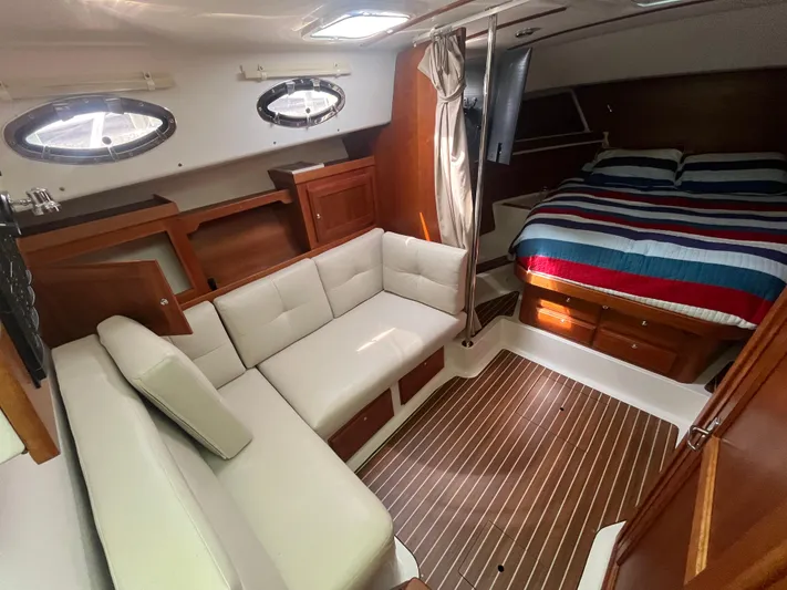  Yacht Photos Pics Interior of 2016 Back Cove 34 Express yacht with seating and bed.