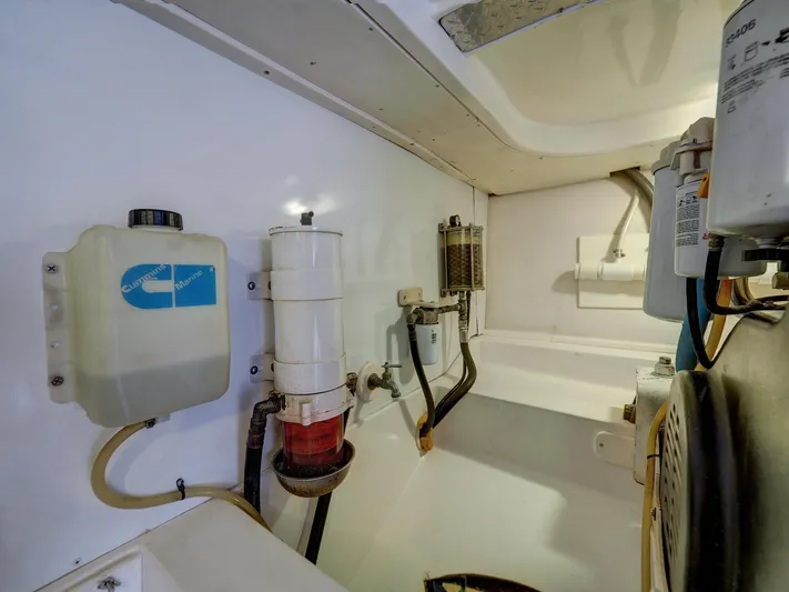 Tight Seal Yacht Photos Pics Engine room of a 2005 Luhrs 41 Convertible boat showing various components.