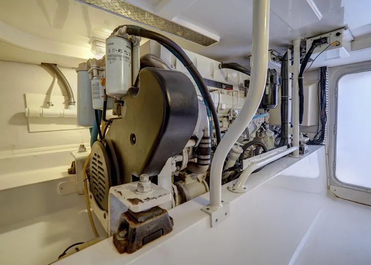 Tight Seal Yacht Photos Pics Engine room of a 2005 Luhrs 41 Convertible boat showing machinery and components.