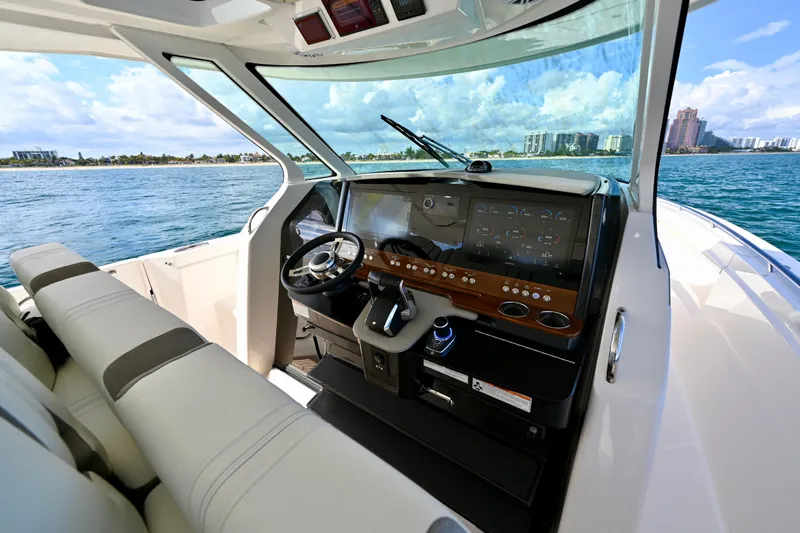 S.y. Royale Yacht Photos Pics 2023 Tiara Sport 38 LS boat interior with modern dashboard and ocean view.