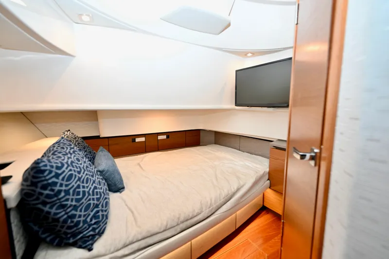 S.y. Royale Yacht Photos Pics Luxurious cabin interior of 2023 Tiara Sport 38 LS yacht with modern amenities.