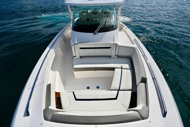 S.y. Royale Yacht Photos Pics 2023 Tiara Sport 38 LS luxury boat with spacious seating on open water.
