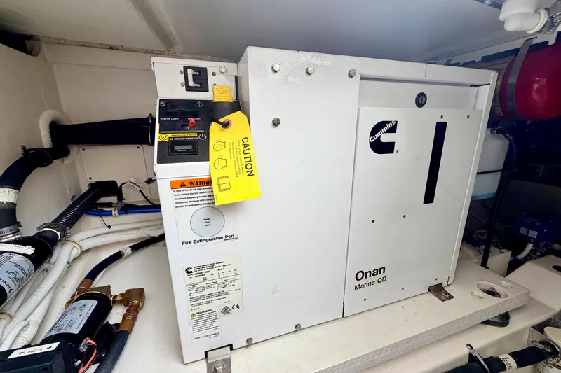 S.y. Royale Yacht Photos Pics Cummins Onan Marine QD generator in 2023 Tiara Sport 38 LS boat engine room.
