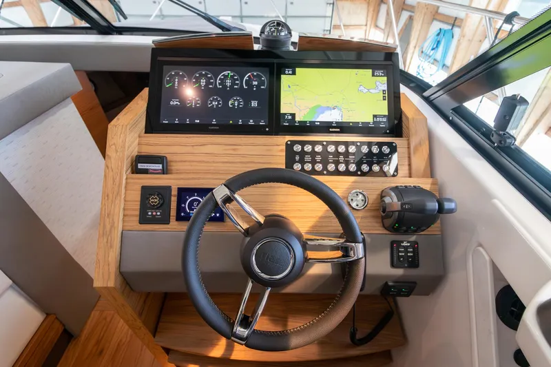 Noor Yacht Photos Pics 2023 Tiara Yachts C44 Coupe helm with modern navigation and control systems.