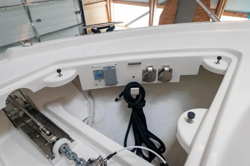Noor Yacht Photos Pics 2023 Tiara Yachts C44 Coupe deck with anchor chain and control panel.