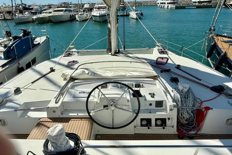  Yacht Photos Pics Cockpit view of 2011 Lagoon LAGOON 500 yacht docked in marina.