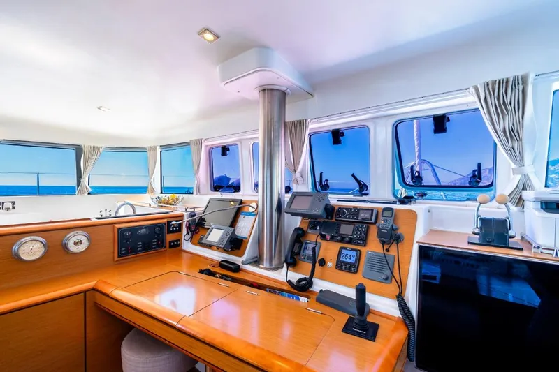  Yacht Photos Pics Interior view of 2011 Lagoon LAGOON 500 yacht cockpit with navigation equipment.