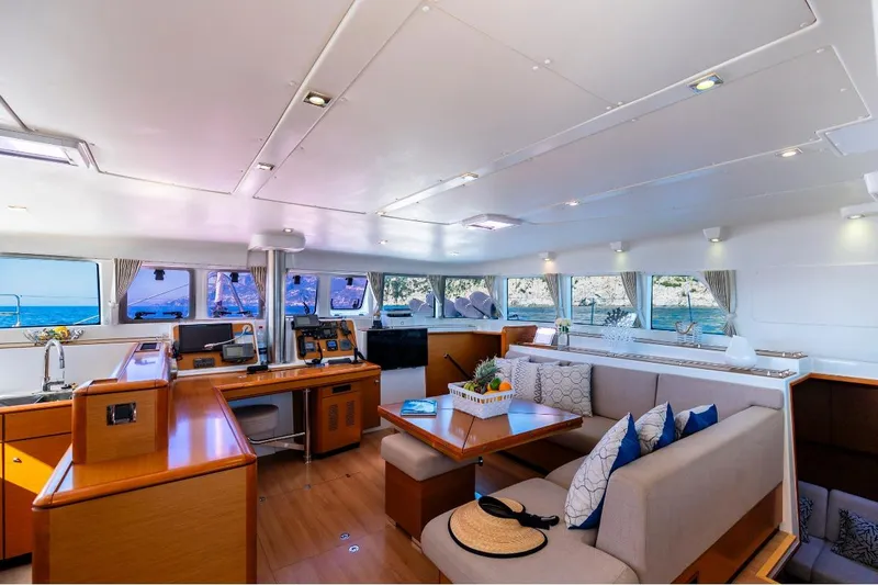  Yacht Photos Pics Luxurious interior of 2011 Lagoon LAGOON 500 yacht with modern furnishings and panoramic windows.