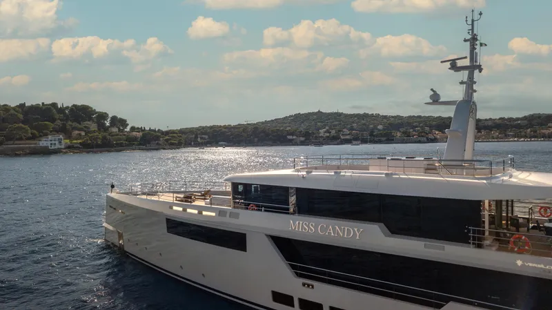 Miss Candy Yacht Photos Pics Luxurious Versilcraft HS yacht "Miss Candy" cruising on serene waters, 2022 model.